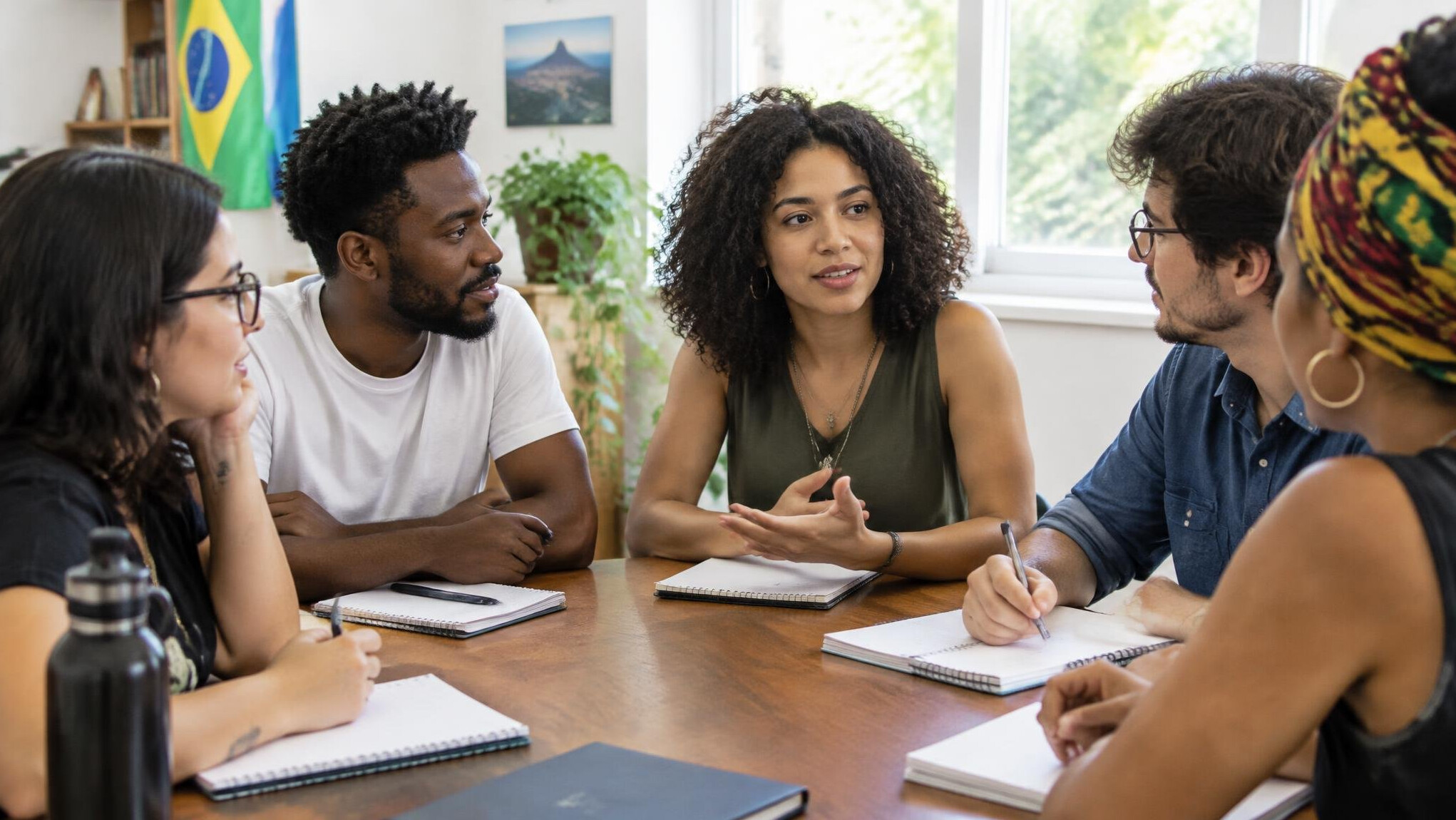 Group of people having a discussion around a table