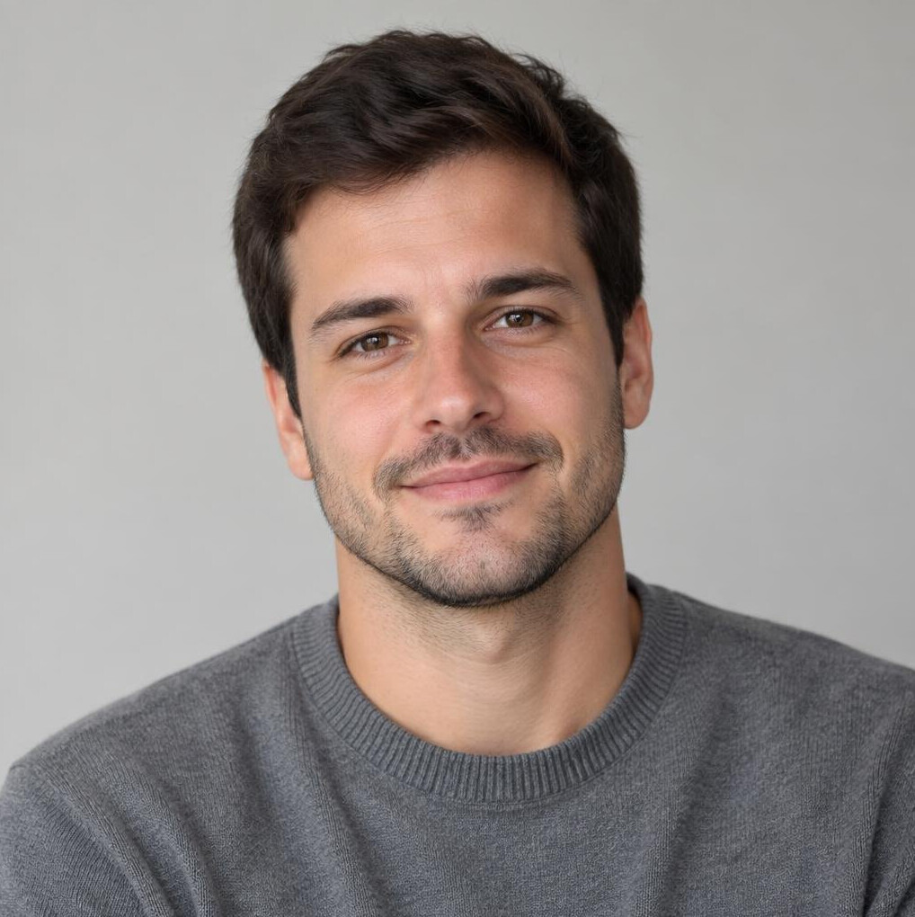 Portrait of a young man with short hair and light stubble