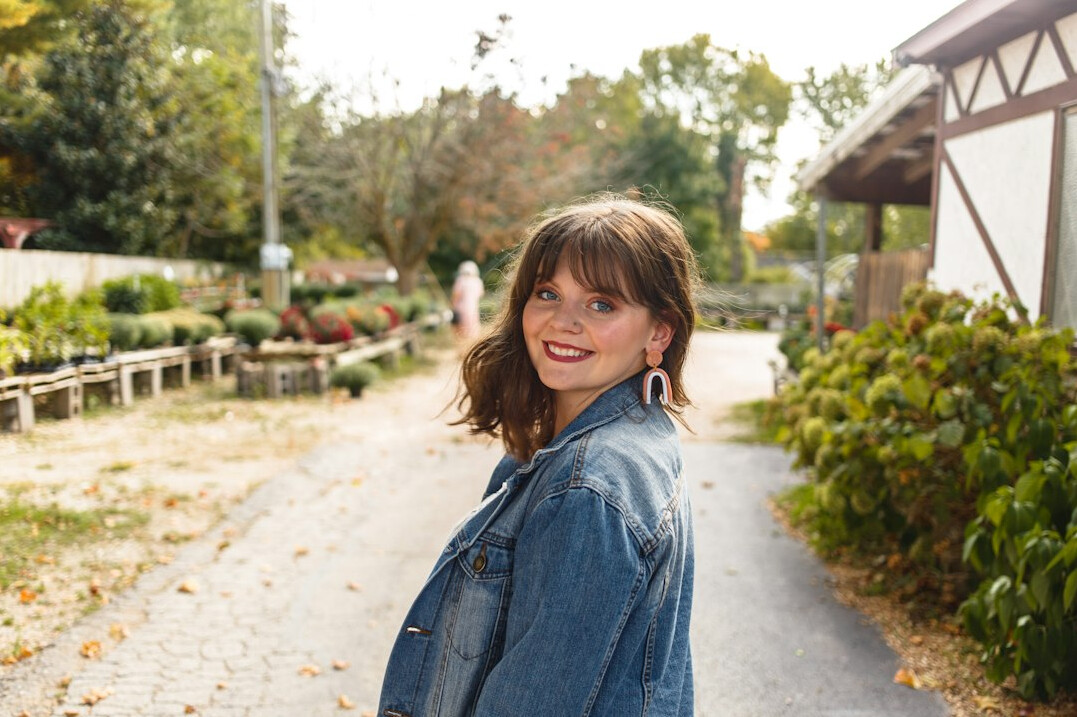 Portrait of a smiling young woman with brown hair